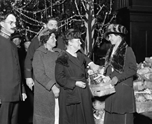 Mrs. Coolidge handing out Christmas dinner at the Salvation Army, Washington D.C Mrs. Coolidge handing out Christmas dinner at the Salvation Army, Washington D.C