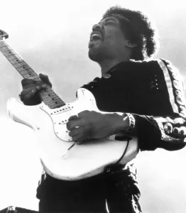 Prints of JIMI HENDRIX (1942-1970). American musician. Photographed during a concert at Berkeley, California in 1970 Music Prints: Jimi Hendrix Print: Berkeley Concert Photograph