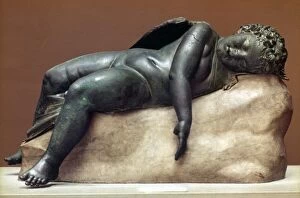 MYTHOLOGY: SLEEPING EROS. Hellenistic bronze from Greece, 250-150 B.C