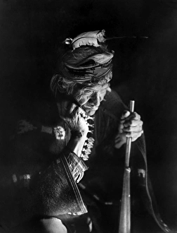 NAVAJO MAN, c1915. Bitter Recollections. An elderly Navajo man holding a rifle. Photograph by William Carpenter, c1915 NAVAJO MAN, c1915. Bitter Recollections. An elderly Navajo man holding a rifle. Photograph by William Carpenter, c1915