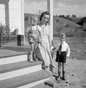 NEW HOME, 1941. The Smith family standing outside of their new home in Riner, Virginia NEW HOME, 1941. The Smith family standing outside of their new home in Riner, Virginia