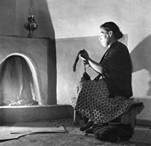 NEW MEXICO: SPINNING, 1943. Maclovia Lopez, wife of Mayor Juan Lopez of Trampas NEW MEXICO: SPINNING, 1943. Maclovia Lopez, wife of Mayor Juan Lopez of Trampas