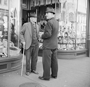 NEW YORK: AMSTERDAM, 1941. Men on the street in Amsterdam, New York NEW YORK: AMSTERDAM, 1941. Men on the street in Amsterdam, New York