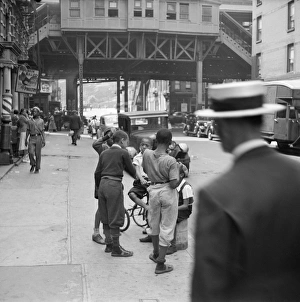 NEW YORK CITY, 1938. Boys on the street in Harlem, New York City NEW YORK CITY, 1938. Boys on the street in Harlem, New York City