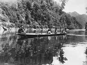 NEW ZEALAND, c1920. Maori people canoeing, probably on the Wanganui River, in New Zealand NEW ZEALAND, c1920. Maori people canoeing, probably on the Wanganui River, in New Zealand