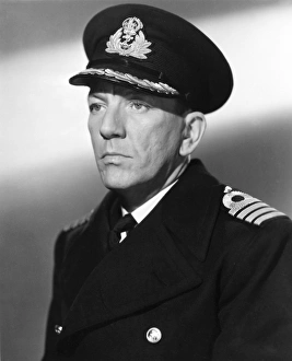 NOEL COWARD (1899-1973). English actor and playwright. Coward as the naval captain in In Which We Serve, 1941 NOEL COWARD (1899-1973). English actor and playwright. Coward as the naval captain in In Which We Serve, 1941