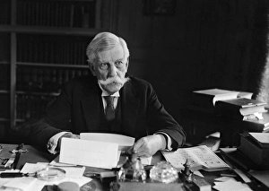 OLIVER WENDELL HOLMES, JR. (1841-1935). American jurist. Photographed seated at his desk OLIVER WENDELL HOLMES, JR. (1841-1935). American jurist. Photographed seated at his desk