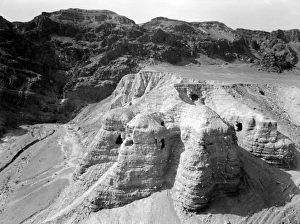 QUMRAN CAVES, c1955. Exterior of the Qumran caves, in which the Dead Sea Scrolls QUMRAN CAVES, c1955. Exterior of the Qumran caves, in which the Dead Sea Scrolls