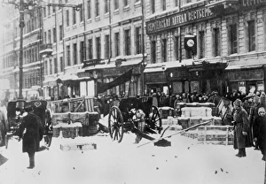 REVOLUTION OF 1917. Field guns under a red banner at a barricade in Petrograd, Russia REVOLUTION OF 1917. Field guns under a red banner at a barricade in Petrograd, Russia
