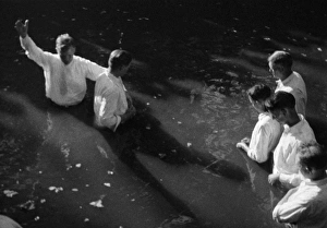 RIVER BAPTISM, 1935. A river baptism near Mineola, Texas. Photograph by Alan Lomax RIVER BAPTISM, 1935. A river baptism near Mineola, Texas. Photograph by Alan Lomax