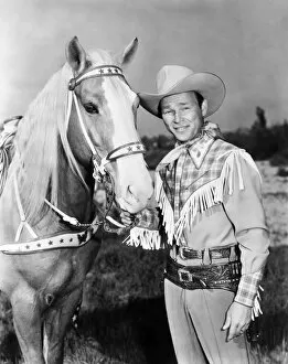 Images Dated 3rd April 2007: ROY ROGERS (1912-1998). Leonard Slye. American singing cowboy actor. With his horse, Trigger