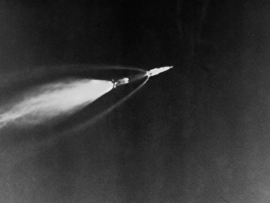 Saturn V, the launch vehicle for the Apollo 11 mission to the moon. Photographed while the first stage of the rocket is Saturn V, the launch vehicle for the Apollo 11 mission to the moon. Photographed while the first stage of the rocket is