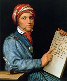 SEQUOYA (1770?-1843). Native American scholar, with his printed Cherokee alphabet SEQUOYA (1770?-1843). Native American scholar, with his printed Cherokee alphabet