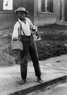 SHOE SHINER, c1899. An African-American shoe shiner, c1899 SHOE SHINER, c1899. An African-American shoe shiner, c1899