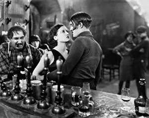 SILENT FILM: PARIS, 1926. Joan Crawford and Douglas Gilmore at the bar of an Apache Den in Paris, 1926
