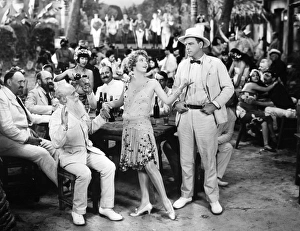 <b class=qtipBold><figcaption>Silent Film Still: Drinking</figcaption></b><br>Silent Film Still: Drinking.<br><em>© none</em> Silent Film Still: Drinking