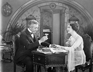 <b class=qtipBold><figcaption>Silent Film Still: Drinking</figcaption></b><br>Silent Film Still: Drinking.<br><em>© none</em> Silent Film Still: Drinking