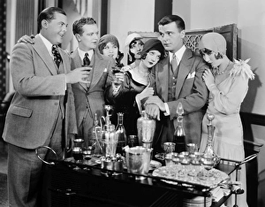 <b class=qtipBold><figcaption>Silent Film Still: Drinking</figcaption></b><br>Silent Film Still: Drinking.<br><em>© none</em> Silent Film Still: Drinking