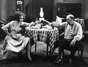 <b class=qtipBold><figcaption>Silent Film Still: Drinking</figcaption></b><br>Silent Film Still: Drinking.<br><em>© none</em> Silent Film Still: Drinking