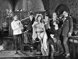 <b class=qtipBold><figcaption>Silent Film Still: Drinking</figcaption></b><br>Silent Film Still: Drinking.<br><em>© none</em> Silent Film Still: Drinking