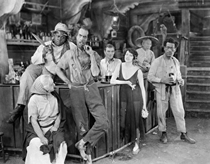 <b class=qtipBold><figcaption>Silent Film Still: Drinking</figcaption></b><br>Silent Film Still: Drinking.<br><em>© none</em> Silent Film Still: Drinking