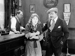 <b class=qtipBold><figcaption>Silent Film Still: Drinking</figcaption></b><br>Silent Film Still: Drinking.<br><em>© none</em> Silent Film Still: Drinking