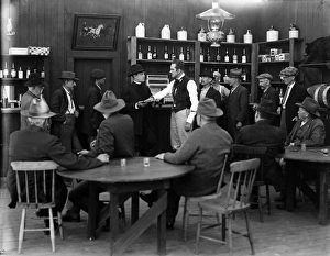 <b class=qtipBold><figcaption>Silent Film Still: Drinking</figcaption></b><br>Silent Film Still: Drinking.<br><em>© none</em> Silent Film Still: Drinking