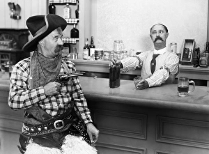 <b class=qtipBold><figcaption>Silent Film Still: Drinking</figcaption></b><br>Silent Film Still: Drinking.<br><em>© none</em> Silent Film Still: Drinking