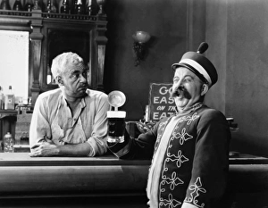 <b class=qtipBold><figcaption>Silent Film Still: Drinking</figcaption></b><br>Silent Film Still: Drinking.<br><em>© none</em> Silent Film Still: Drinking