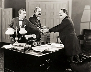 <b class=qtipBold><figcaption>Silent Film Still: Offices</figcaption></b><br>Silent Film Still: Offices.<br><em>© none</em> Silent Film Still: Offices