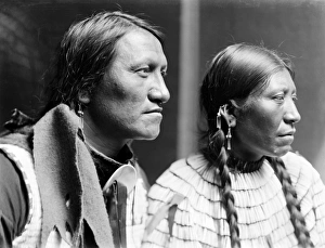 SIOUX COUPLE, c1900. Charging Thunder, a Sioux Native American, and his wife SIOUX COUPLE, c1900. Charging Thunder, a Sioux Native American, and his wife