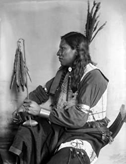 SIOUX NATIVE AMERICAN, c1900. Shooting Pieces, a Sioux Native American from Buffalo SIOUX NATIVE AMERICAN, c1900. Shooting Pieces, a Sioux Native American from Buffalo
