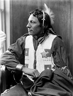 SIOUX NATIVE AMERICAN, c1900. An unidentified Sioux, a member of Buffalo Bills Wild West SIOUX NATIVE AMERICAN, c1900. An unidentified Sioux, a member of Buffalo Bills Wild West