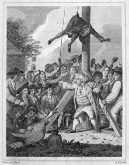 STAMP ACT, 1765. Stamp agent strung up on a Liberty Pole during an anti-Stamp Act demonstration in the American STAMP ACT, 1765. Stamp agent strung up on a Liberty Pole during an anti-Stamp Act demonstration in the American