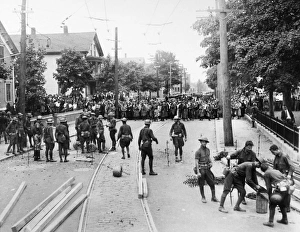 State troopers erecting barbed wire fences during disturbancies associated with the State troopers erecting barbed wire fences during disturbancies associated with the