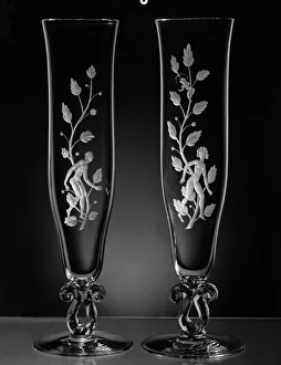 Steuben Glass flutes with designs by Eric Gill, c1939 Steuben Glass flutes with designs by Eric Gill, c1939