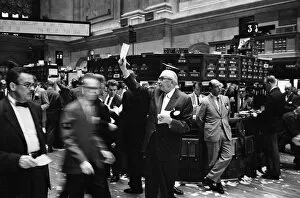 Trader Gallery: STOCK EXCHANGE, 1963. Stock brokers trading on the floor of the New York Stock Exchange