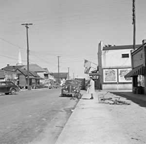 STREET SCENE, c1940. View of American street, probably Daytona Beach, Florida. Photograph STREET SCENE, c1940. View of American street, probably Daytona Beach, Florida. Photograph