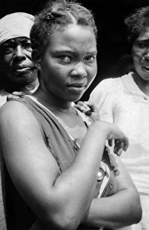 SUGAR MILL WORKER, 1934. A baptist woman at the Alma plantation, False River, Louisiana SUGAR MILL WORKER, 1934. A baptist woman at the Alma plantation, False River, Louisiana
