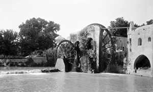 SYRIA: NORIAS, c1910. Norias on the Orontes River in Hama, Syria. Photograph, c1910 SYRIA: NORIAS, c1910. Norias on the Orontes River in Hama, Syria. Photograph, c1910