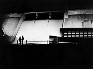 New Deal Gallery: TENNESSEE: NORRIS DAM. The Norris Dam and powerhouse lit by floodlights, on the