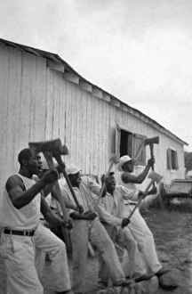 TEXAS: PRISONERS, 1934. Lightnin Washington, an African American prisoner, singing TEXAS: PRISONERS, 1934. Lightnin Washington, an African American prisoner, singing