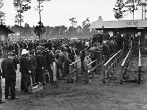 Unemployed carpenters and construction workers lined up outside the office of the State Unemployed carpenters and construction workers lined up outside the office of the State