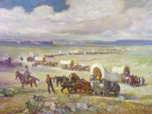 WAGON TRAIL. A wagon train of settlers crossing the plains of the American West WAGON TRAIL. A wagon train of settlers crossing the plains of the American West