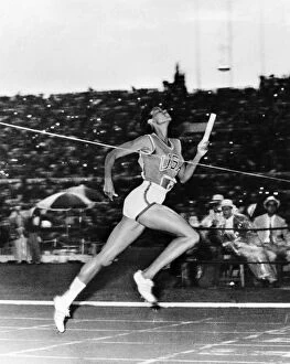 WILMA RUDOLPH (1940-1994). American track and field athlete. Crossing the finish line to win the 400-meter relay for