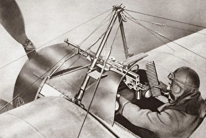 A World War I aviator seated behind his machine gun. Photo and illustration, c1918 A World War I aviator seated behind his machine gun. Photo and illustration, c1918
