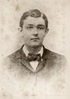 YOUNG MAN, c1880. Portrait of a young man. Carte de visite from a photography studio in YOUNG MAN, c1880. Portrait of a young man. Carte de visite from a photography studio in