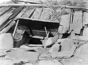 YUROK SWEAT LODGE, c1923. A sweat lodge, an underground building surrounded by YUROK SWEAT LODGE, c1923. A sweat lodge, an underground building surrounded by