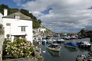 Prints of The fishing village of Polperro on the South coast of Cornwall, at high tide on a afternoon in late summer Polperro Prints: Polperro Cornwall Print at High Tide