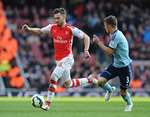 Aaron Ramsey (Arsenal) Aaron Creswell (West Ham). Arsenal 3:0 West Ham United. Barclays Aaron Ramsey (Arsenal) Aaron Creswell (West Ham). Arsenal 3:0 West Ham United. Barclays